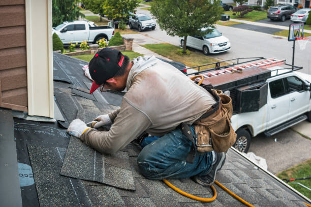 Professional Flat Roof Repair technician working in Talisheek, LA